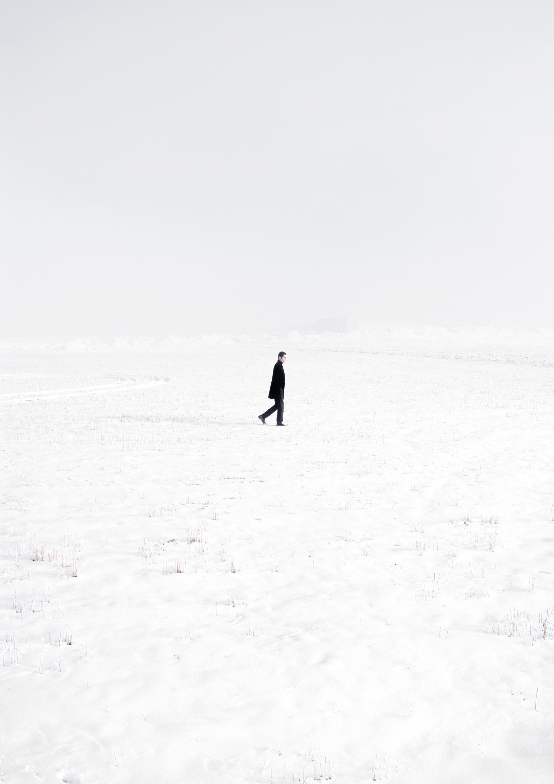 Photo by Amir Esrafili from Pexels: https://www.pexels.com/photo/lonely-man-in-middle-of-snowy-valley-6555781/